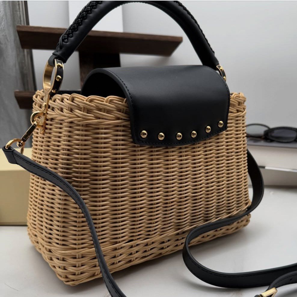 Louis Vuitton Capucines BB Rattan Bag - Black (Category: Beach Bags) located in Makati City. Submitted by lottielabouff (Listing ID 1461502054, Image 2). Description: Louis Vuitton Capucines BB Rattan Bag Color: Black Width : 10.63” / 27cm Depth : 5.51” / 14cm Height : 7.09” / 18cm Shoulder strap : 49.21” / 125cm [PRICE] Bought for 441K JPY (180,000 PHP) Selling for 58000 PHP • Selling my bags for affordable price • Price is still negotiable, dro