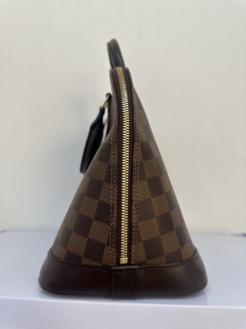 Louis Vuitton Damier Ebene Alma BB (Category: Luxury Bags & Wallets) located in Malabon City. Submitted by everythingpreloveddd (Listing ID 1461375287, Image 2). Description: - Classic Louis Vuitton Alma BB Bag - Authentic Damier Ebene Monogram Canvas - Structured Design with Leather Trim & Handles - Elegant Gold-Tone Hardware - Secure Zipper Closure - Ideal for Everyday Use - Spacious Interior for Essentials.