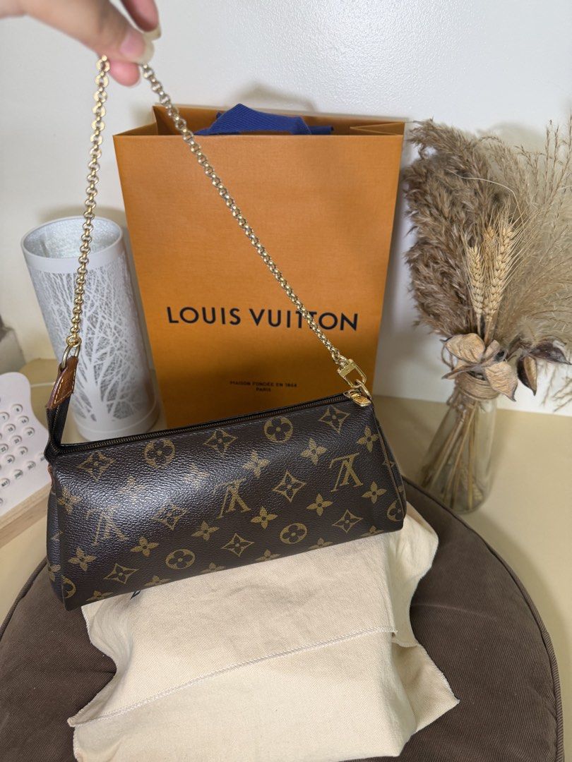Louis Vuitton Eva Monogram Clutch Rare piece! (Category: Luxury Bags & Wallets) located in Bulacan. Submitted by GeezLouise (Listing ID 1461420694, Image 2). Description: AUTHENTIC LV Eva Monogram Clutch 🤎 💯 100% Authentic 🇯🇵 Bought in Japan 😍 Rare LV piece, talagang hinanap ko ’to before I got my hands on this one! 📦 Inclusions: ✔️ Dust bag ✔️ Long strap ⚠️ Flaws (please see detailed photos): ▫️ Dryness and cracks on the long strap ▫️ Mini