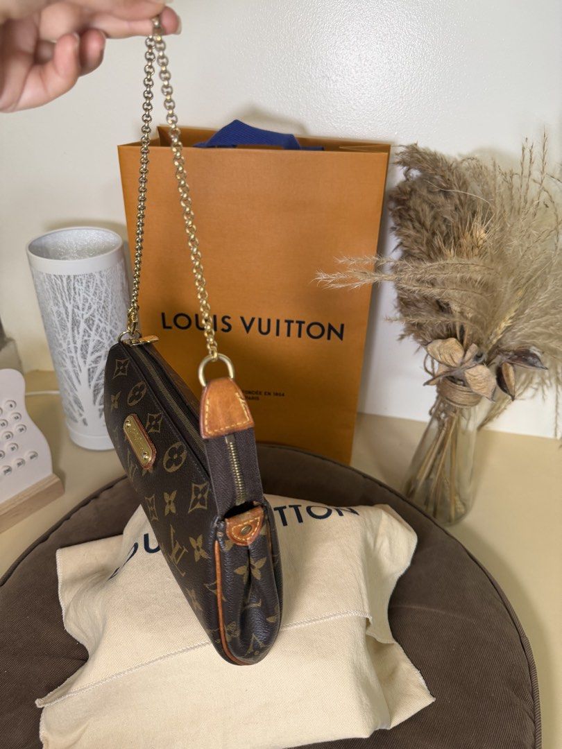 Louis Vuitton Eva Monogram Clutch Rare piece! (Category: Luxury Bags & Wallets) located in Bulacan. Submitted by GeezLouise (Listing ID 1461420694, Image 3). Description: AUTHENTIC LV Eva Monogram Clutch 🤎 💯 100% Authentic 🇯🇵 Bought in Japan 😍 Rare LV piece, talagang hinanap ko ’to before I got my hands on this one! 📦 Inclusions: ✔️ Dust bag ✔️ Long strap ⚠️ Flaws (please see detailed photos): ▫️ Dryness and cracks on the long strap ▫️ Mini