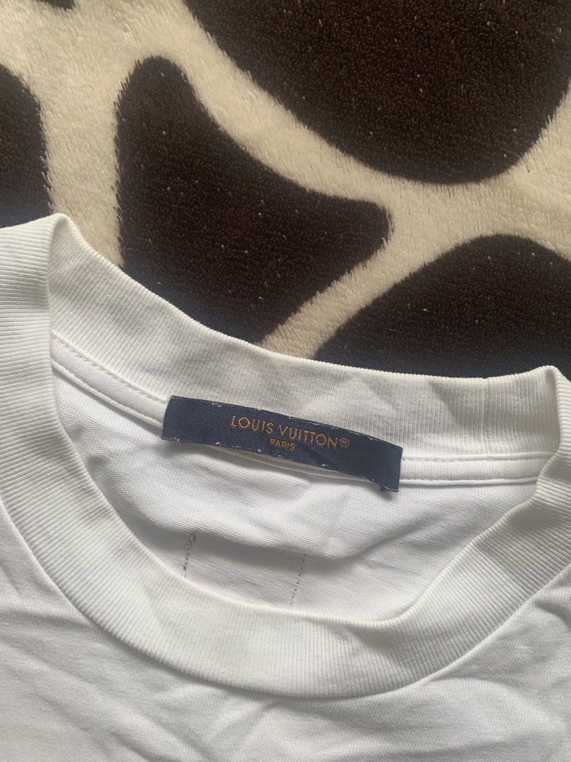 Louis Vuitton Graphic Tee (Category: Tshirts & Polo Shirts ) located in Kabacan. Submitted by nevr_outofstyle (Listing ID 1461364072, Image 3). Description: Louis Vuitton Graphic Tee S on tag fit M-L Details W- 20.5” L- 28” good condition issue: peelings, small washable dirt stain (see pics) need wash buyer will shoulder the delivery fee MOP: Gcash 🚚 J&T.