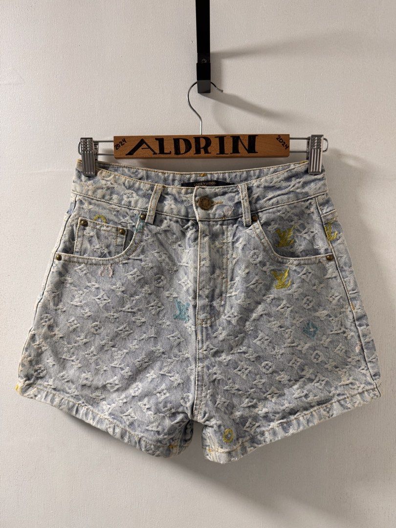Louis Vuitton Monogram Denim Shorts (Category: Shorts) located in Cavite. Submitted by aldrindela40142 (Listing ID 1461534476, Image 1). Description: - Light wash denim shorts - All-over LV monogram print - Colorful embroidered LV logos on front pockets - Leather patch and cloud detail on back - Button and zip closure - High-waisted style.