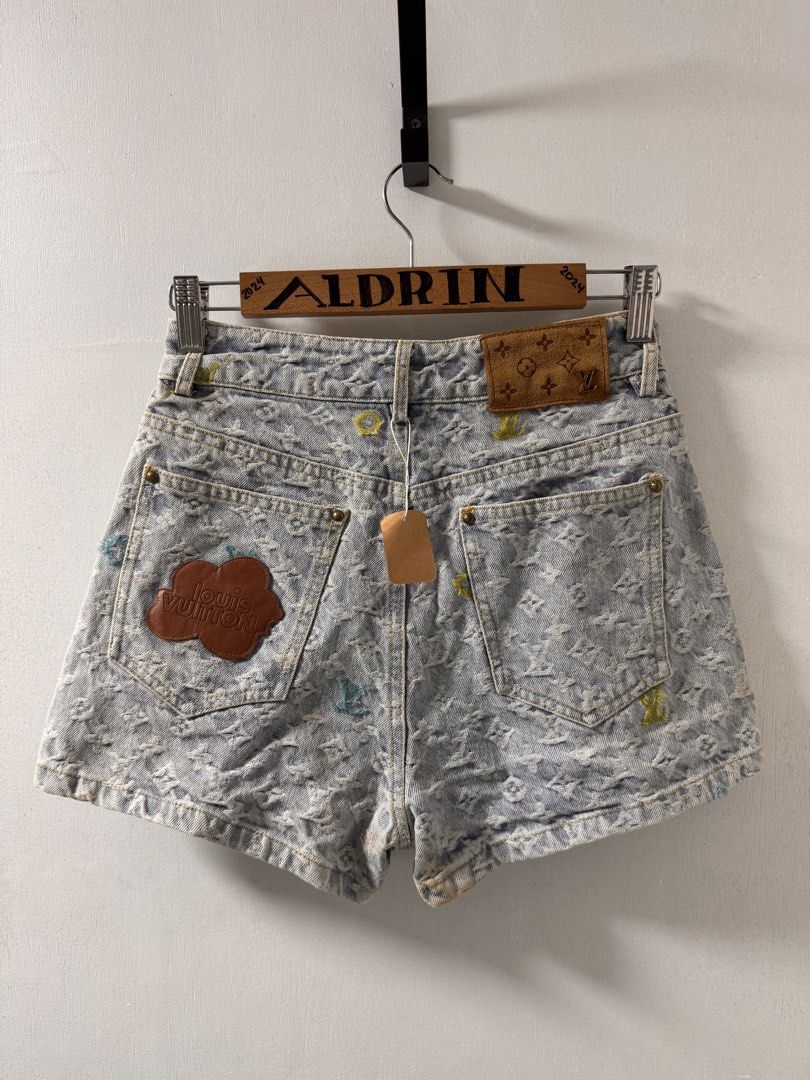 Louis Vuitton Monogram Denim Shorts (Category: Shorts) located in Cavite. Submitted by aldrindela40142 (Listing ID 1461534476, Image 2). Description: - Light wash denim shorts - All-over LV monogram print - Colorful embroidered LV logos on front pockets - Leather patch and cloud detail on back - Button and zip closure - High-waisted style.