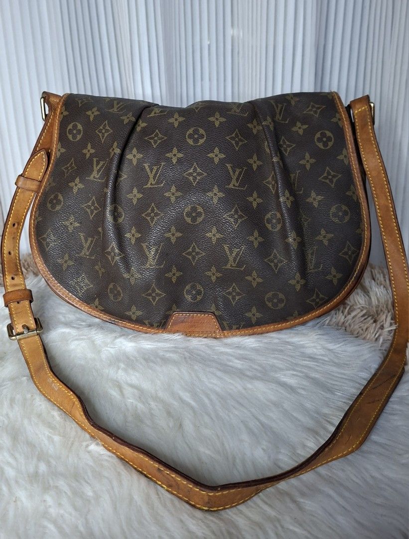 Louis Vuitton Monogrammed Shoulder Bag (Category: Luxury Bags & Wallets) located in Nabua. Submitted by alasaasche36553 (Listing ID 1461438085, Image 1). Description: - Classic Louis Vuitton Monogram shoulder bag - Interior is clean - Zipper functions well - Adjustable strap for comfort - Ideal for everyday essentials - Date code visible inside.