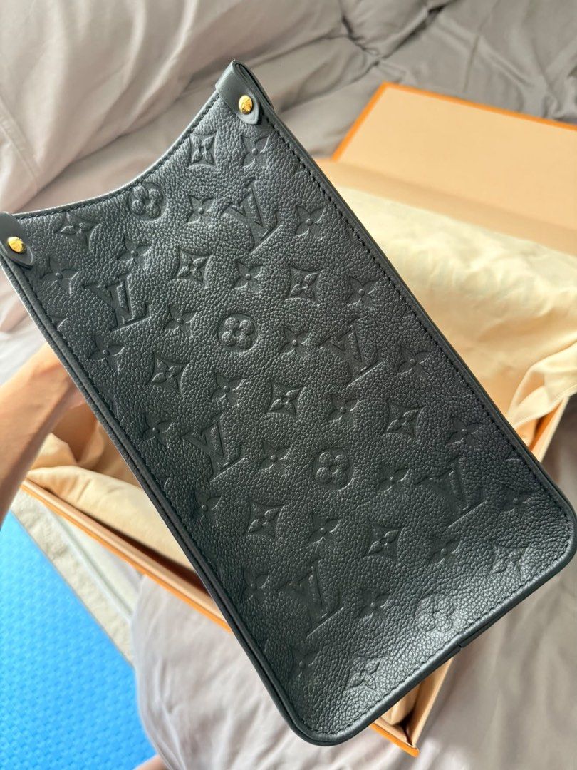 Louis Vuitton Pre-Owned OnTheGo MM Monogram Empreinte (Category: Luxury Bags & Wallets) located in Mandaluyong City. Submitted by vmerck01 (Listing ID 1461446385, Image 2). Description: This pre-owned Louis Vuitton OnTheGo MM is an excellent choice for someone looking for a sophisticated, structured luxury tote that combines everyday functionality with the understated elegance of Monogram Empreinte embossed leather. The spacious interior provides
