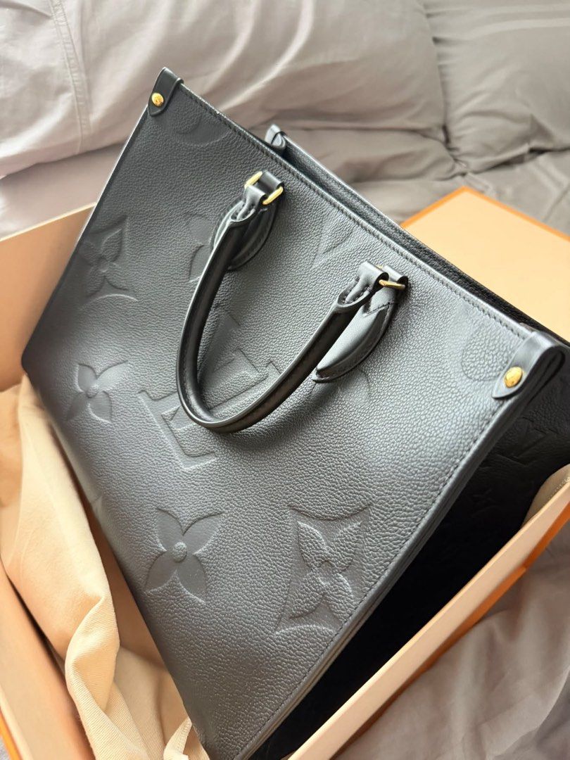 Louis Vuitton Pre-Owned OnTheGo MM Monogram Empreinte (Category: Luxury Bags & Wallets) located in Mandaluyong City. Submitted by vmerck01 (Listing ID 1461446385, Image 1). Description: This pre-owned Louis Vuitton OnTheGo MM is an excellent choice for someone looking for a sophisticated, structured luxury tote that combines everyday functionality with the understated elegance of Monogram Empreinte embossed leather. The spacious interior provides