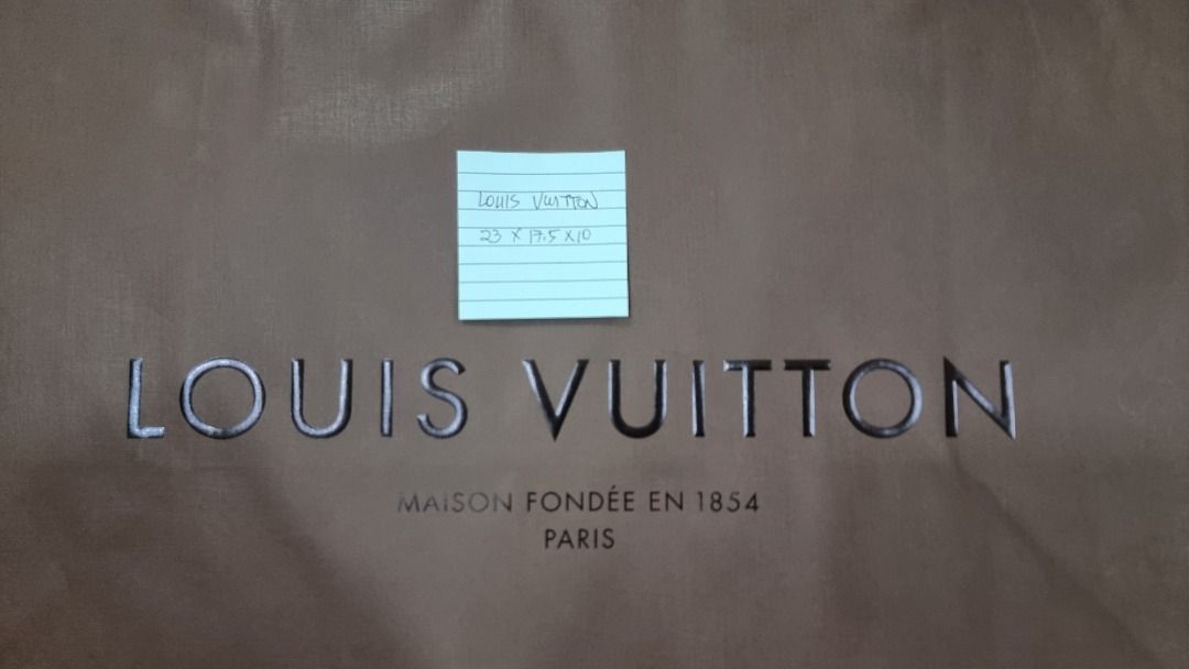 Louis Vuitton Shopping Bag (Category: Luxury Bags & Wallets) located in Paranaque City. Submitted by olxph_668280920 (Listing ID 1461489997, Image 3). Description: - Authentic Louis Vuitton paper shopping bag - "Maison fondée en 1854 Paris" branding - Approximate dimensions: 25.5cm (L) x 17.5cm (H) x 6cm (W) - Perfect for storage or carrying small items.