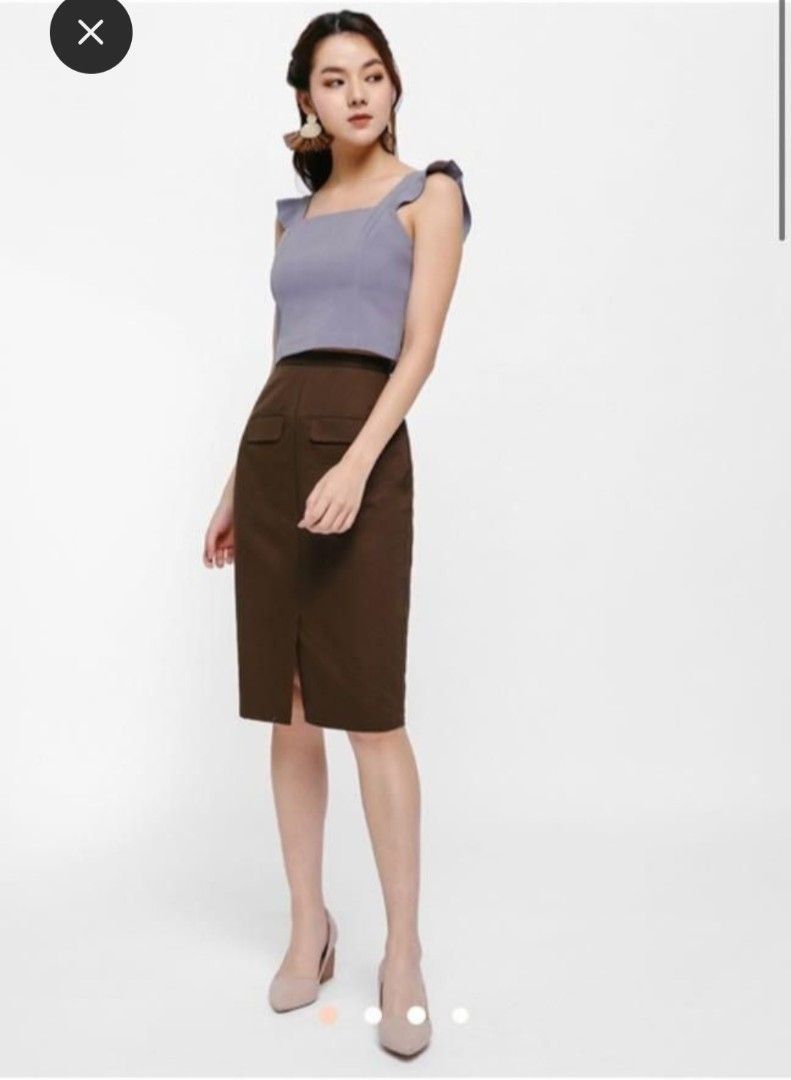 Love Bonito Chadwick Flutter Strap Fitted Crop Top (Category: Sleeveless) located in Manaoag. Submitted by dressupdear (Listing ID 1461349035, Image 2). Description: Size: Medium We're obsessed with fitted crop tops lately - they require no tucking in fuss and fit closely to the frame, lending our silhouettes a smart sleekness when paired with a high-waisted bottom. Flutter straps add a fun anc feminine touch. Exposed open-end back zip closure wi