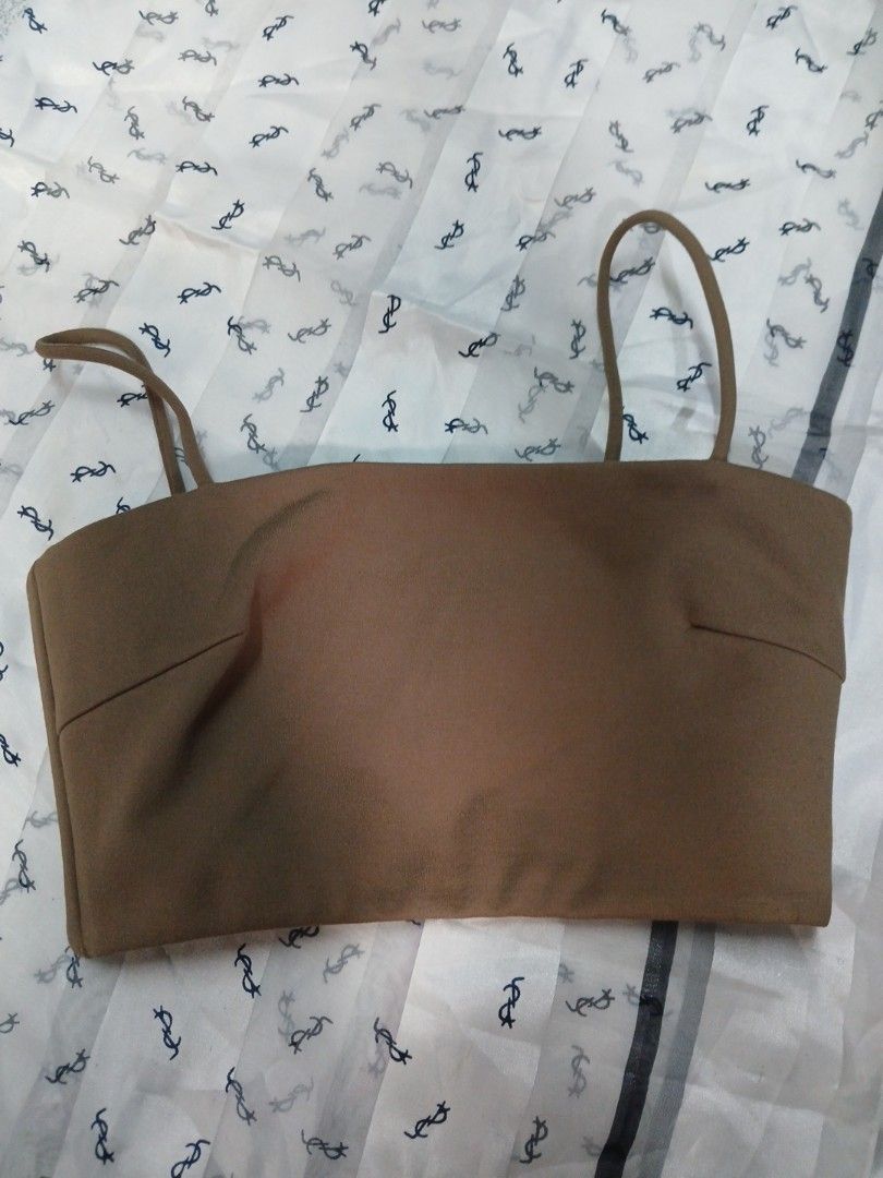 Love bonito top (Category: Purses & Pouches) located in La Trinidad. Submitted by dashopperist (Listing ID 1461345528, Image 1). Description: - Brand: Lovebonito - Color: Brown - Style Number: HYS093 - Material: 65% Rayon, 27% Nylon, 3% Elastane - Care Instructions: Hand wash cold, do not bleach, do not hang dry, low heat iron only - Features: Two small straps on the sides.