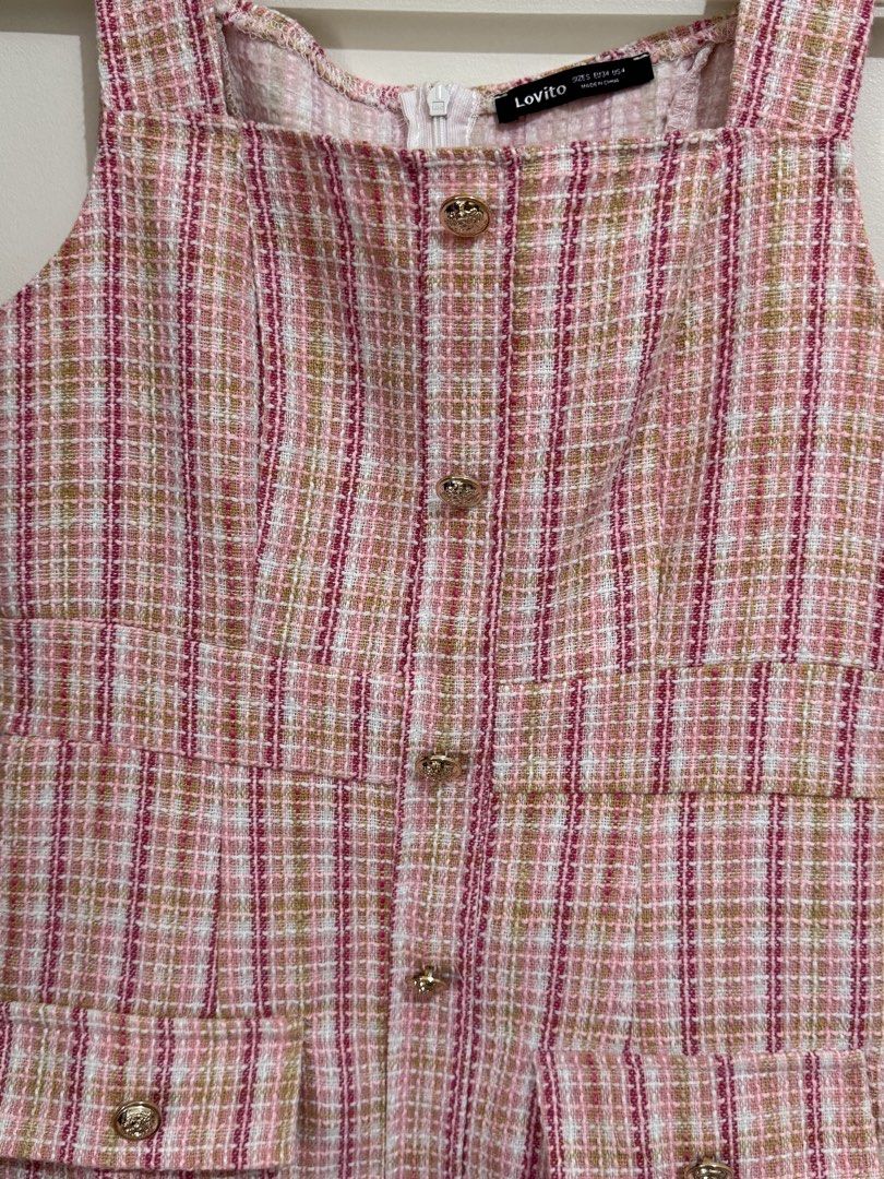 Lovito Pink Plaid Tweed Button Front Mini Dress (Category: Dresses) located in Pasig City. Submitted by yensyard__ (Listing ID 1461382055, Image 2). Description: - s frame - 29 inches - Lovito pink plaid tweed mini dress - Features a stylish square neckline - Functional button front closure - Two front pockets with button details - Sleeveless design for a chic look - Versatile for casual or dressed-up occasions.