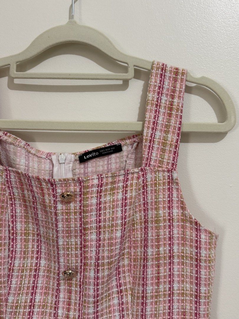 Lovito Pink Plaid Tweed Button Front Mini Dress (Category: Dresses) located in Pasig City. Submitted by yensyard__ (Listing ID 1461382055, Image 3). Description: - s frame - 29 inches - Lovito pink plaid tweed mini dress - Features a stylish square neckline - Functional button front closure - Two front pockets with button details - Sleeveless design for a chic look - Versatile for casual or dressed-up occasions.