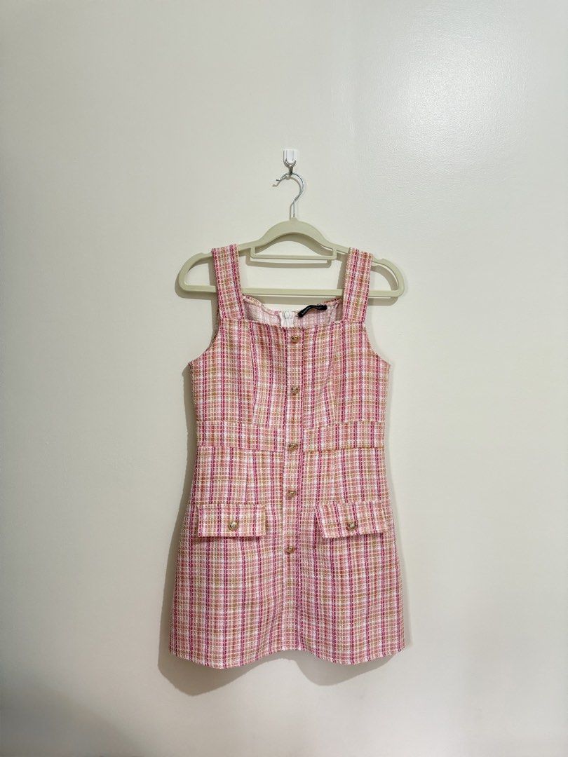 Lovito Pink Plaid Tweed Button Front Mini Dress (Category: Dresses) located in Pasig City. Submitted by yensyard__ (Listing ID 1461382055, Image 1). Description: - s frame - 29 inches - Lovito pink plaid tweed mini dress - Features a stylish square neckline - Functional button front closure - Two front pockets with button details - Sleeveless design for a chic look - Versatile for casual or dressed-up occasions.