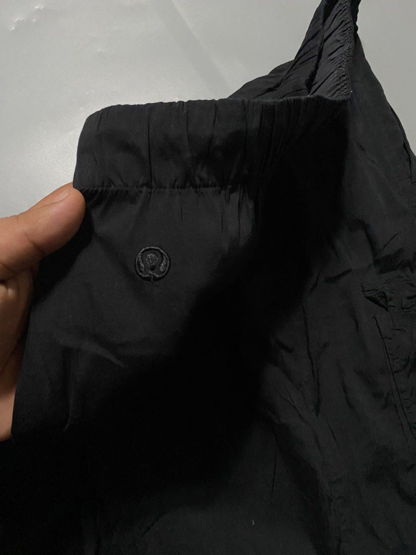 Lululemon Black Cargo Pants (Category: Other Bottoms) located in Manila. Submitted by delunakenn94368 (Listing ID 1461537699, Image 3). Description: - Lululemon black cargo pants - Elastic waistband with adjustable drawstring - Multiple front and side pockets - Adjustable drawstring at the hem - Lightweight, versatile fabric - Ideal for casual outings or workouts.
