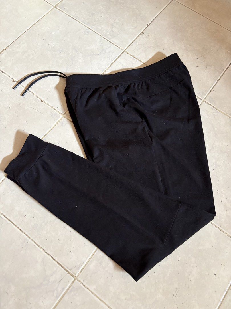 Lululemon Black Jogger Pants S/P (Category: Other Bottoms) located in Manila. Submitted by manifest_05 (Listing ID 1461328761, Image 1). Description: - Lululemon Joggers - Color: Black - Size: S/P (Small/Petite) - Made in the Philippines - Fabric: Nylon and Lycra Elastane blend - Features: Drawstring waist - Ideal for: Workouts or casual wear - Fit: Comfortable.