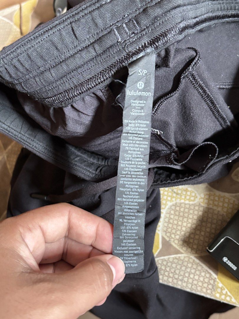 Lululemon Black Jogger Pants S/P (Category: Other Bottoms) located in Manila. Submitted by manifest_05 (Listing ID 1461328761, Image 3). Description: - Lululemon Joggers - Color: Black - Size: S/P (Small/Petite) - Made in the Philippines - Fabric: Nylon and Lycra Elastane blend - Features: Drawstring waist - Ideal for: Workouts or casual wear - Fit: Comfortable.