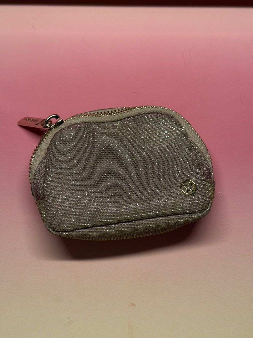 Lululemon Pink Glitter Pouch/Coin Purse (Category: Purses & Pouches) located in Makati City. Submitted by kamsahamniduh (Listing ID 1461530722, Image 1). Description: Authentic.