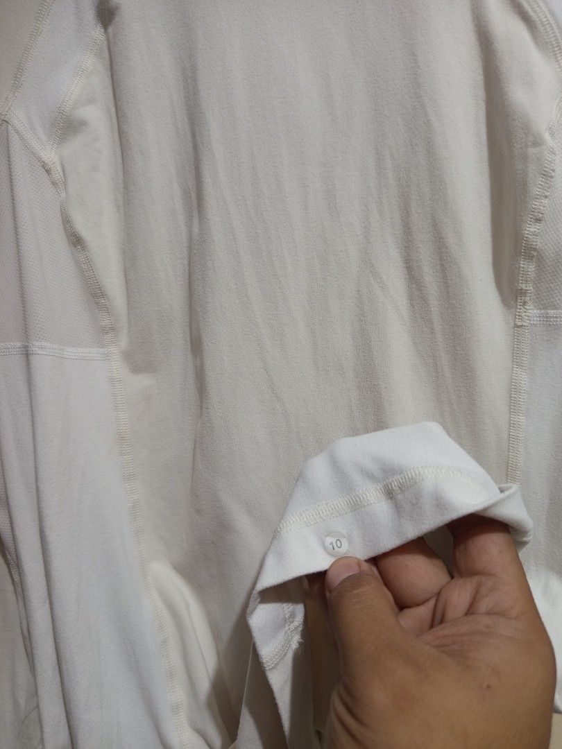 Lululemon Run Speedy Turtleneck Polar cream (Category: Activewear) located in Calamba. Submitted by indiecated.thriftnshop (Listing ID 1461496907, Image 3). Description: Lululemon Run Speedy Turtleneck Polar cream dot 10 25 Shoulder to hem 16 pit to pit.