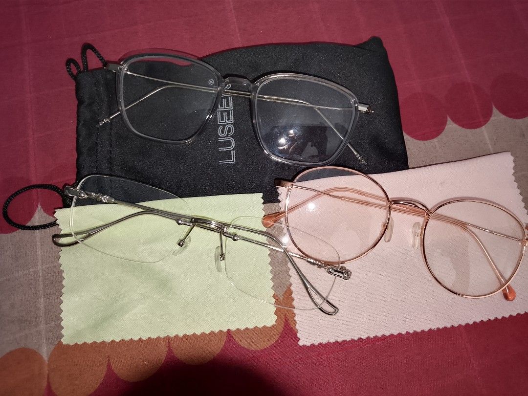 LUSEE Eyeglasses Set - Clear, Rose Gold, Silver Frames (Category: Sunglasses & Eyewear) located in Manila. Submitted by anayaella (Listing ID 1461408292, Image 1). Description: - Set of 3 eyeglasses for versatile style. - LUSEE clear square frames: Classic and modern. - Rose gold round frames: Trendy and chic. - Silver half-rimless with intricate arm details: Elegant and sophisticated. - Each pair comes with a cleaning cloth and a pouch. - Ideal 