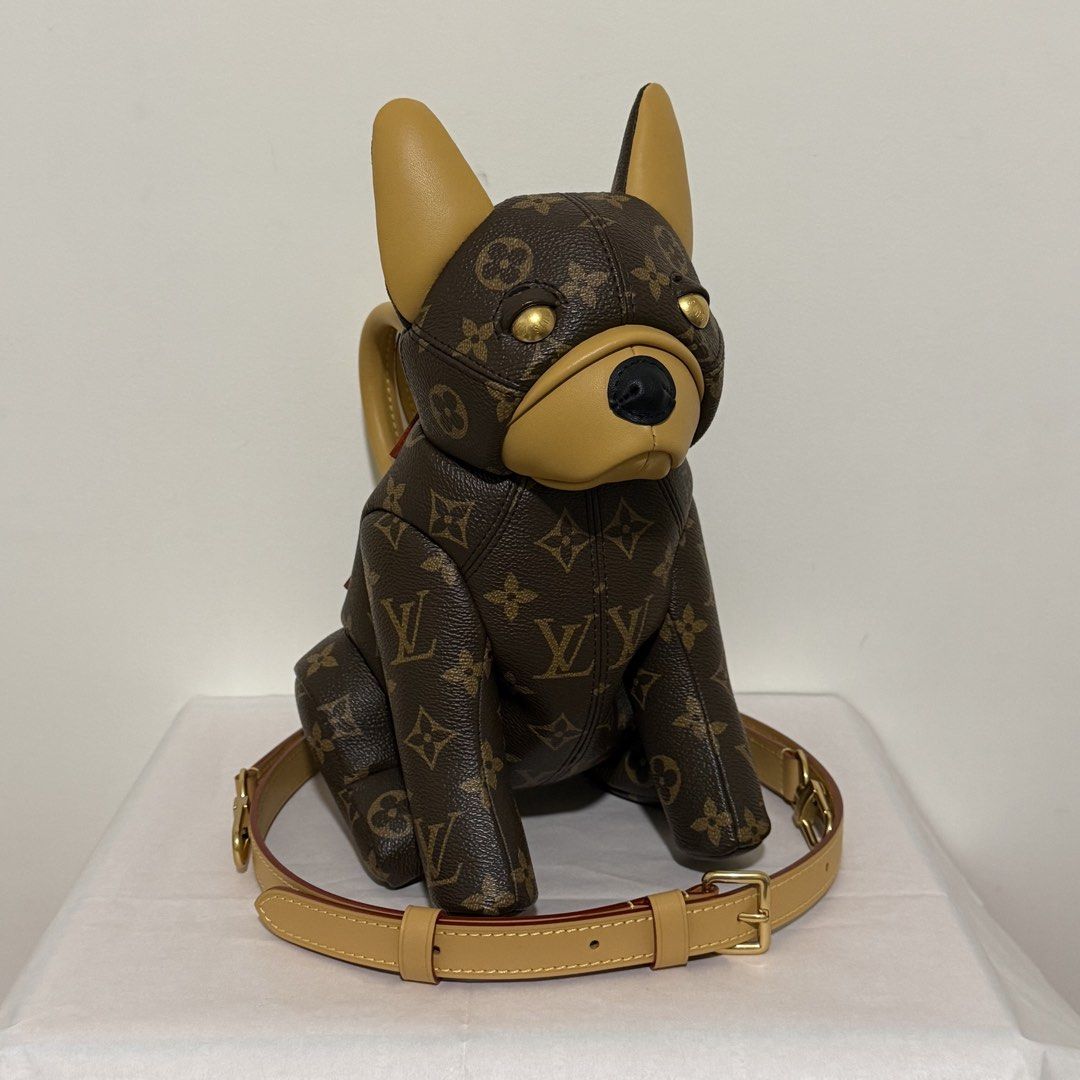 LV Pooch Bag Monogram (Category: Luxury Bags & Wallets) located in Manila. Submitted by poppyany (Listing ID 1461326332, Image 1). Description: LV Pooch Bag in Monogram. With box and paperbag..