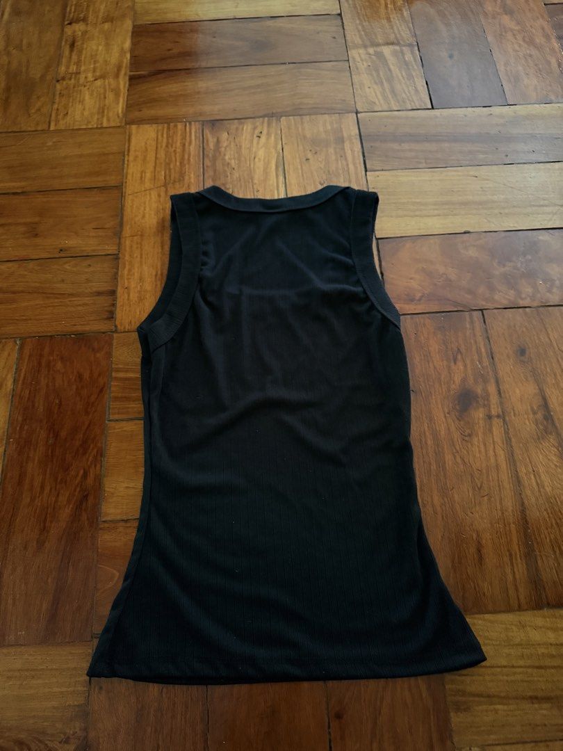 Mafie Black Ribbed Tank Top (Category: Sleeveless) located in Carmona. Submitted by prelovedbyallia (Listing ID 1461398985, Image 2). Description: Mafie Black Ribbed tank top in M-L! • Neckline: Square • Size: M-L! (but best fits M) • Only worn once! MOP: BPI, BDO or GCash MOD: J&T or Lalamove Thank you! .