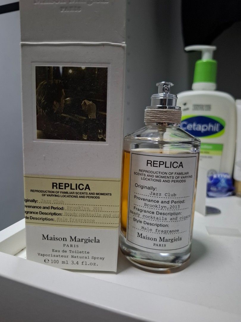Maison Margiela Replica Eau de Toilette 100ml (Category: Fragrance & Deodorants) located in Manila. Submitted by villin87 (Listing ID 1461517008, Image 1). Description: - Maison Margiela Replica Eau de Toilette - Scent: 'Jazz Club' - Size: 100ml - Includes original box - Perfect for lovers of warm, woody fragrances.