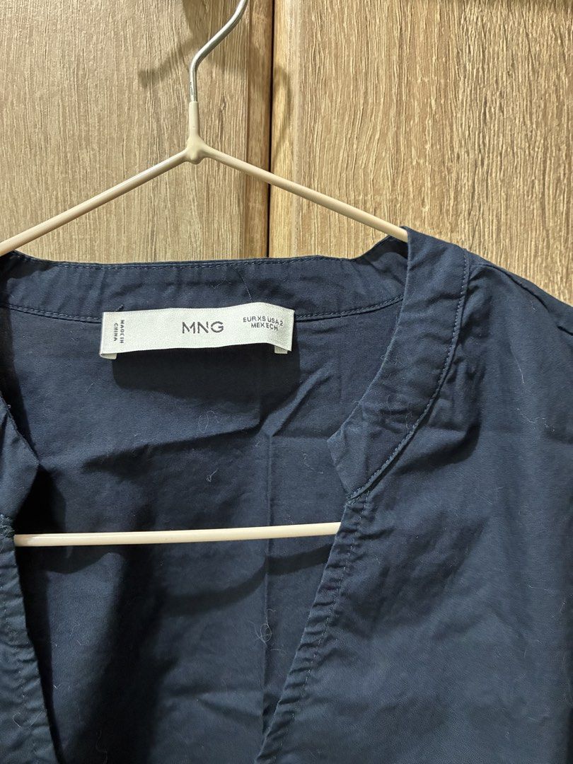 Mango Navy Blue Wrap Dress (Category: Dresses) located in Makati City. Submitted by kmc01 (Listing ID 1461484260, Image 2). Description: - Mango navy blue wrap dress - Long sleeves - Tie waist - Simple and classic design - Perfect for casual or semi-formal events - Easy to style.