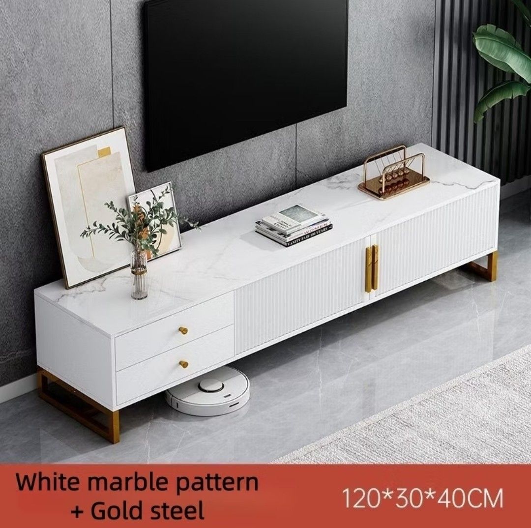 Marble White + Gold Classic Minimalist TV Rack (Category: TV Consoles) located in Quezon City. Submitted by lorenandi (Listing ID 1461348621, Image 2). Description: * 120 x 30 x 40cm * Already built * Used for 1 month only. Selling because will upgrade to a bigger one.
