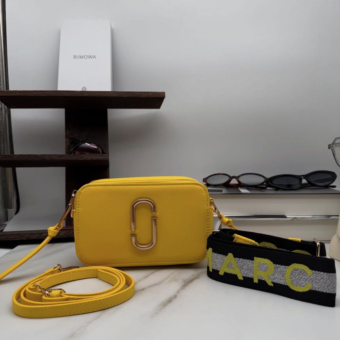 Marc Jacobs The Snapshot Camera Cross Body Bag (Category: Cross-body Bags) located in Makati City. Submitted by lottielabouff (Listing ID 1461490403, Image 1). Description: Marc Jacobs The Snapshot Camera Cross Body Bag [PRICE] Bought in Farfetch for 425 USD (24,600 PHP) Selling for 8200 PHP • Selling my bags for affordable price • Price is still negotiable, drop your offer thru dm • No box, cards and papers, but i took detailed photos for you to