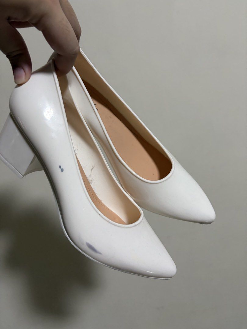 Marche White Pointed Toe Block Heels (Category: Heels) located in San Fernando. Submitted by shabelifer (Listing ID 1461458609, Image 1). Description: - White pointed toe block heels from Marche - Easy slip-on style - Chunky block heel for comfort and stability - Minor marks present, as detailed in photos - Comes with plastic inserts to maintain shape.