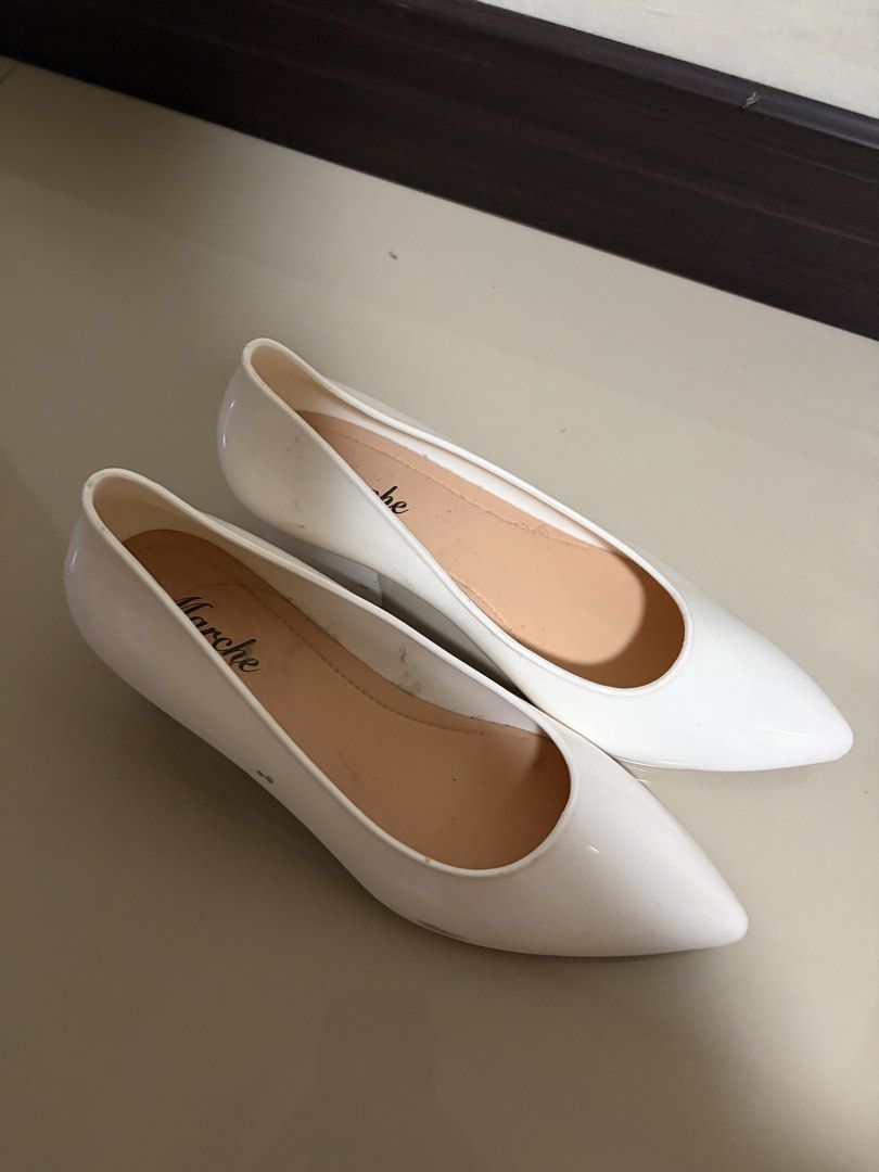 Marche White Pointed Toe Block Heels (Category: Heels) located in San Fernando. Submitted by shabelifer (Listing ID 1461458609, Image 2). Description: - White pointed toe block heels from Marche - Easy slip-on style - Chunky block heel for comfort and stability - Minor marks present, as detailed in photos - Comes with plastic inserts to maintain shape.