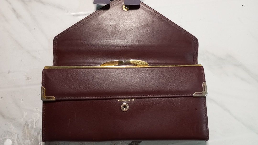 Marco Valese Leather Envelope Wallet (Category: Luxury Bags & Wallets) located in Caloocan City. Submitted by simplyvi21 (Listing ID 1461497028, Image 3). Description: Classic brown leather wallet with gold clasp. Embossed logo. Spacious interior for cards and cash. Perfect for any occasion..