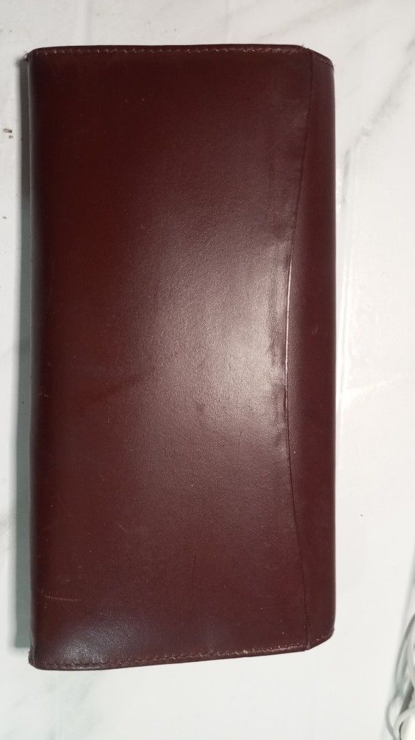 Marco Valese Leather Envelope Wallet (Category: Luxury Bags & Wallets) located in Caloocan City. Submitted by simplyvi21 (Listing ID 1461497028, Image 2). Description: Classic brown leather wallet with gold clasp. Embossed logo. Spacious interior for cards and cash. Perfect for any occasion..