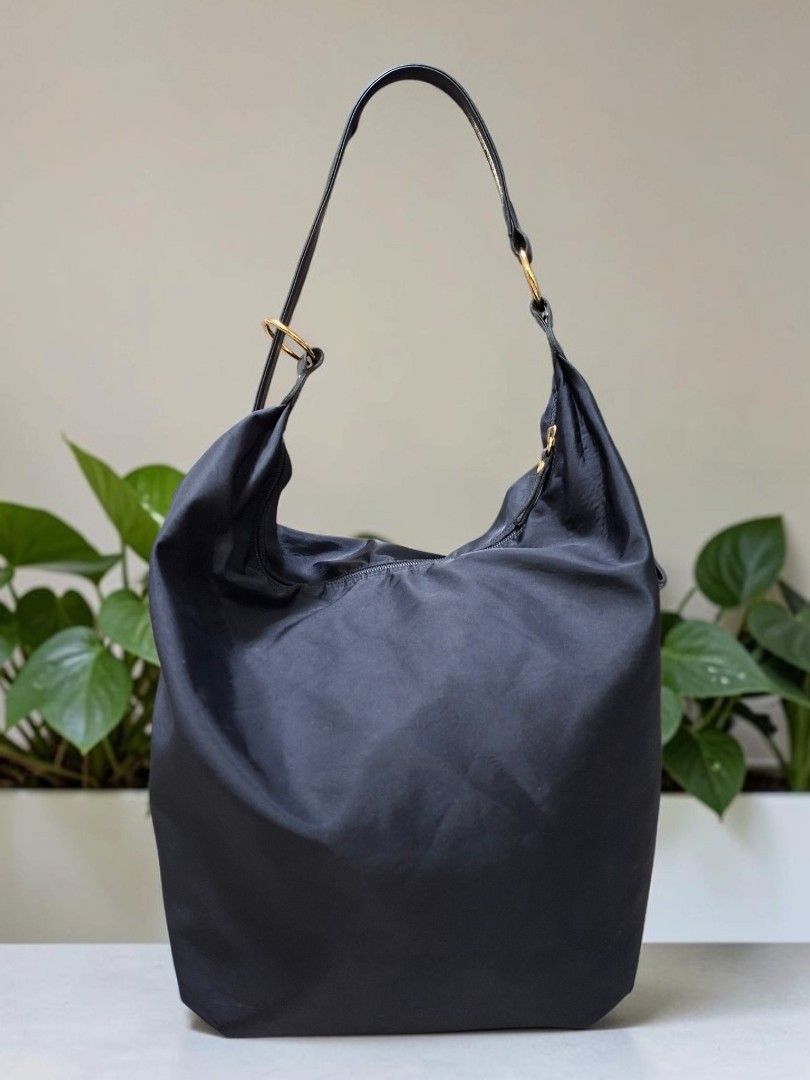 MARIE CLAIRE NYLON HOBO CONVERTIBLE BACKPACK (Category: Shoulder Bags) located in Las Pinas. Submitted by annachiaonair2037 (Listing ID 1461472239, Image 1). Description: MARIE CLAIRE NYLON HOBO CONVERTIBLE BACKPACK FROM JAPAN NICE QUALITY NYLON YKK ZIP H 13" L 15" W 8.5" Disclaimer: I am not affiliated with, associated with, or authorized by any of the brands featured posted. Any mention of brand names, trademarks, or logos is solely for identif