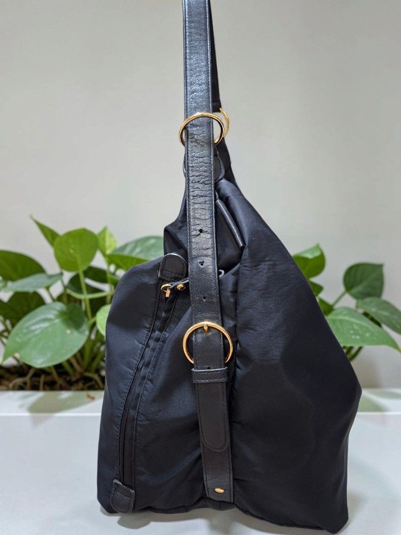 MARIE CLAIRE NYLON HOBO CONVERTIBLE BACKPACK (Category: Shoulder Bags) located in Las Pinas. Submitted by annachiaonair2037 (Listing ID 1461472239, Image 3). Description: MARIE CLAIRE NYLON HOBO CONVERTIBLE BACKPACK FROM JAPAN NICE QUALITY NYLON YKK ZIP H 13" L 15" W 8.5" Disclaimer: I am not affiliated with, associated with, or authorized by any of the brands featured posted. Any mention of brand names, trademarks, or logos is solely for identif