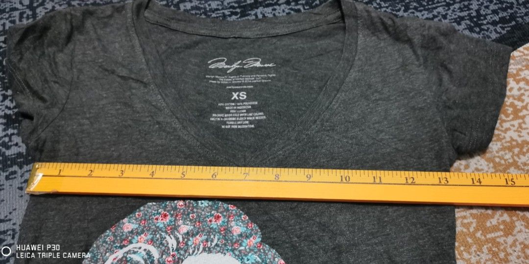 Marilyn Monroe shirt (Category: Shirts) located in San Jose. Submitted by thrift_ni_sir (Listing ID 1461471543, Image 3). Description: Excellent condition Dated 2014 MOD j&t Add shipping fee MOP gcash.