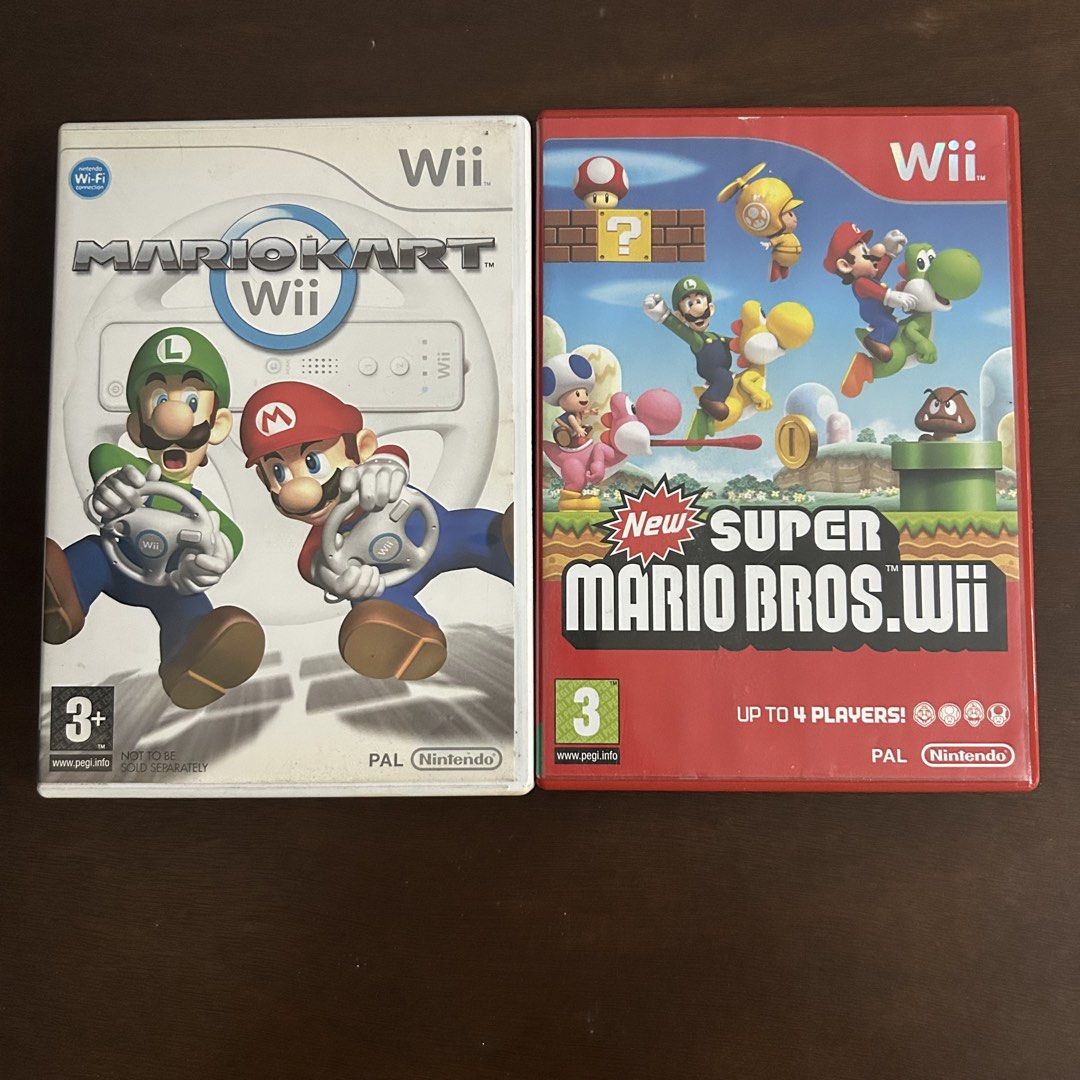 Mario Kart & Super Mario Bros Wii Bundle (Category: Nintendo) located in Quezon City. Submitted by argamenest (Listing ID 1461385806, Image 1). Description: - tested and working - English EUR PAL - take all for 1300Only 📍 Fairview Quezon City.