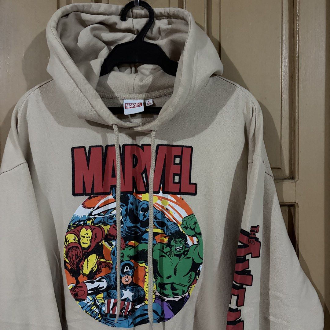 Marvel Avengers Beige Hoodie (Category: Hoodies) located in Apalit. Submitted by zjiules (Listing ID 1461551965, Image 2). Description: Dimes: 25x27.5 Large Color rate: 9.5/10 No issue.