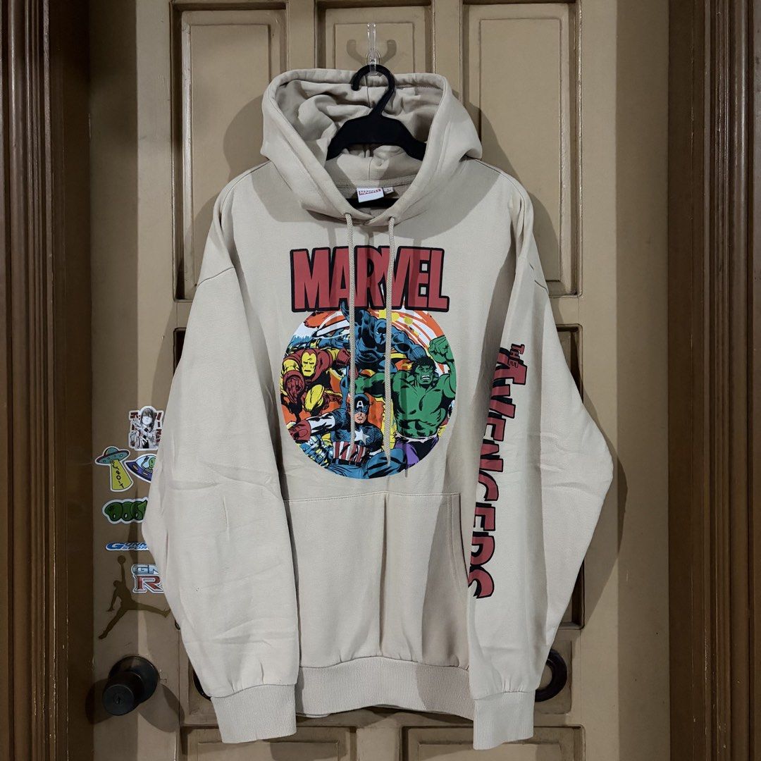 Marvel Avengers Beige Hoodie (Category: Hoodies) located in Apalit. Submitted by zjiules (Listing ID 1461551965, Image 1). Description: Dimes: 25x27.5 Large Color rate: 9.5/10 No issue.