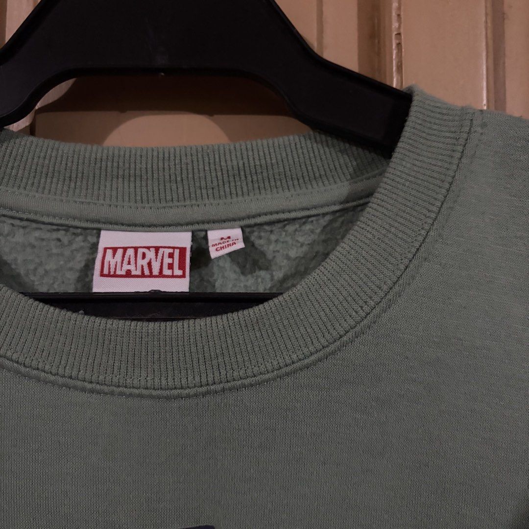 Marvel Spider-Man '62 Green Graphic Sweatshirt (Category: Coats, Jackets and Outerwear) located in Apalit. Submitted by zjiules (Listing ID 1461551963, Image 3). Description: Dimes: 23x27 L Color rate: 10/10 No issue.