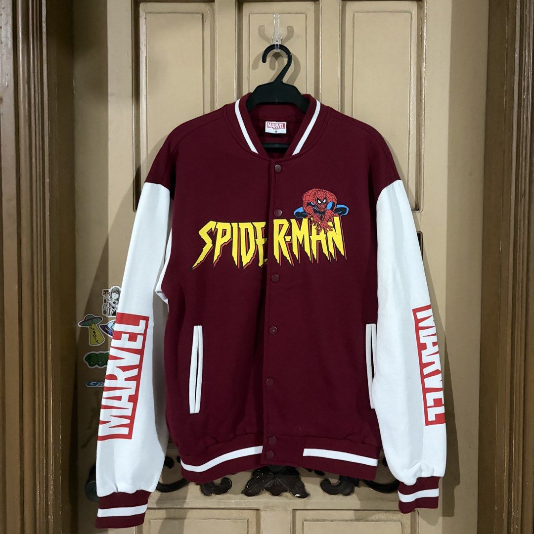 Marvel Spider-Man Varsity Jacket (Category: Coats, Jackets and Outerwear) located in Apalit. Submitted by zjiules (Listing ID 1461551962, Image 1). Description: Dimes: 24x28 L Color rate: 10/10 No issue.