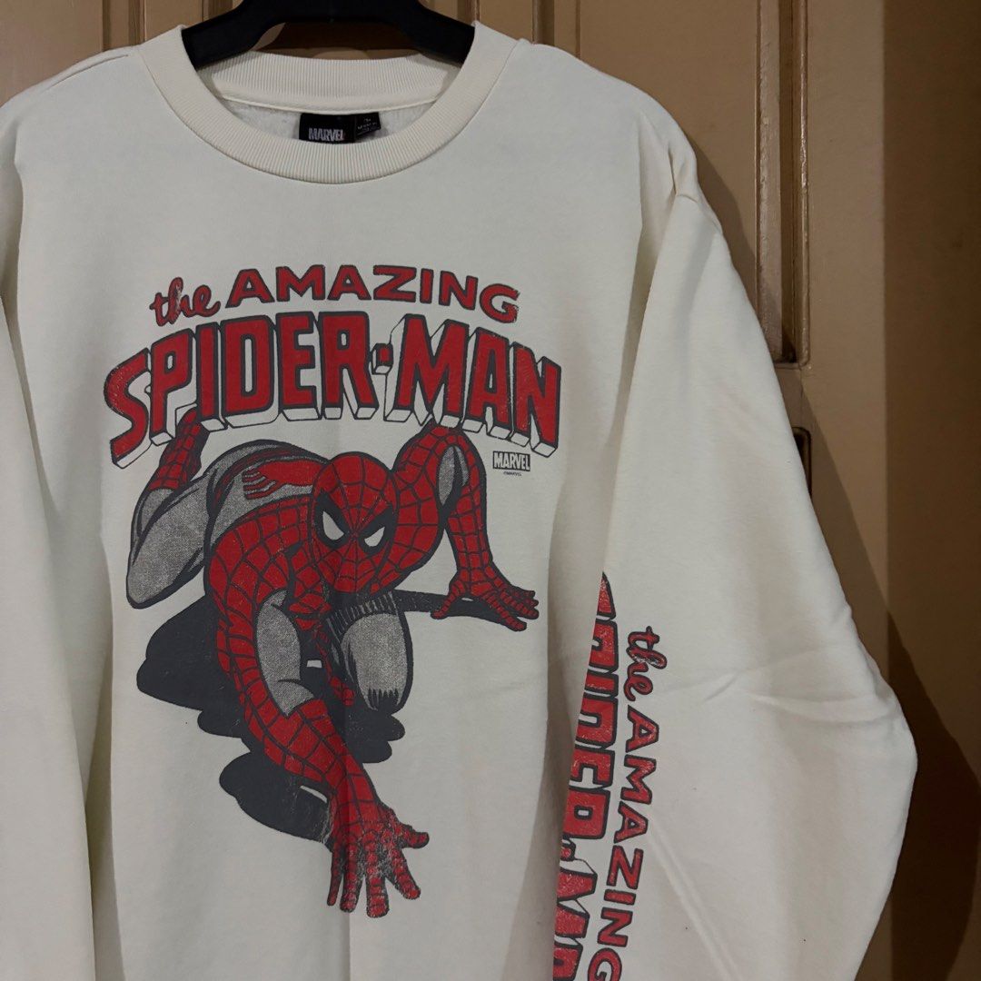 Marvel The Amazing Spider-Man Graphic Sweatshirt (Category: Coats, Jackets and Outerwear) located in Apalit. Submitted by zjiules (Listing ID 1461552521, Image 2). Description: Dimes: 25x27 L Color rate: 10/10 Solid white! No issue.