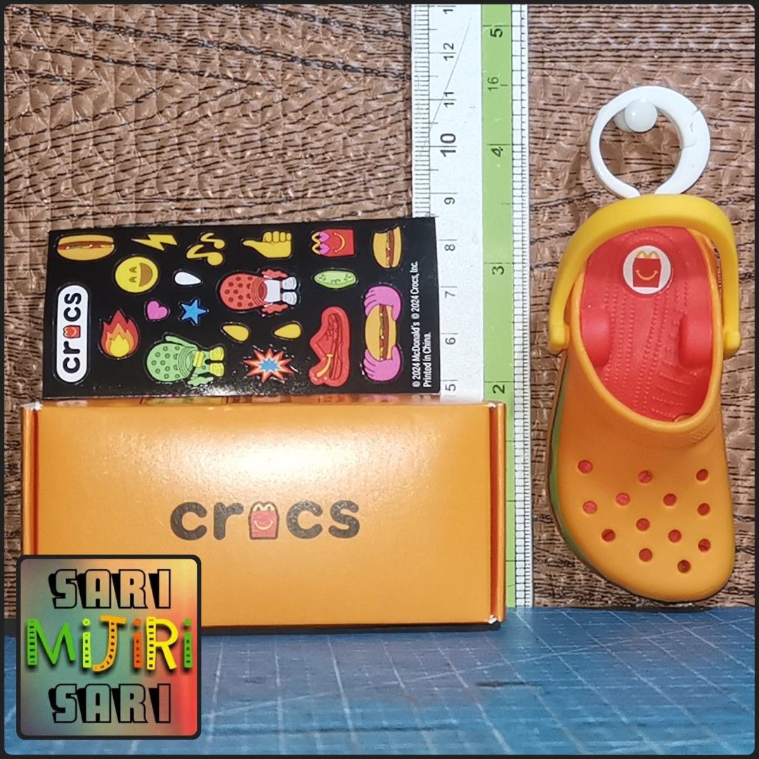 McDonald's BTS Tiny TAN x Crocs Collectibles Set (Category: Designer & Blind Box Toys) located in Quezon City. Submitted by mijirisarisari (Listing ID 1461464861, Image 3). Description: - McDonald's BTS Tiny TAN x Crocs collectible set - Includes BTS figures - Includes Crocs Jibbitz charms - All items are in original packaging - Ideal for BTS fans and collectors.