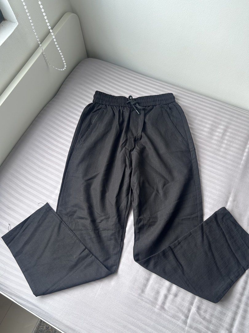 Men Black Elastic Waist Drawstring Pants (Category: Trousers) located in Manila. Submitted by chloemapa (Listing ID 1461368608, Image 1). Description: - Black pants elastis drawstring - Size M - Elastic waistband with drawstring - Front and back pockets - Comfortable for everyday wear - Versatile for styling Bought in vietnam never used; new perfect condition rfs: wrong size; decluttering.