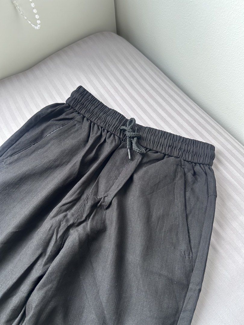 Men Black Elastic Waist Drawstring Pants (Category: Trousers) located in Manila. Submitted by chloemapa (Listing ID 1461368608, Image 2). Description: - Black pants elastis drawstring - Size M - Elastic waistband with drawstring - Front and back pockets - Comfortable for everyday wear - Versatile for styling Bought in vietnam never used; new perfect condition rfs: wrong size; decluttering.
