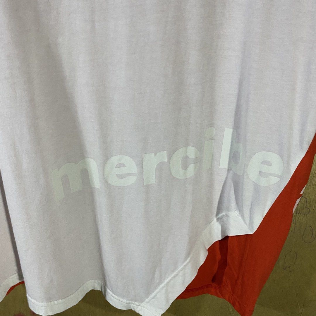 Mercibeaucoup Multicolored Asymmetrical Shirt (Category: Luxury Apparel) located in Baguio. Submitted by goodfinds2600v2 (Listing ID 1461516588, Image 2). Description: Size on tag: 1 fits M-L Dimensions: L-28 W/Bust-25 Description: unisex, boxy fitting Condition: Excellent Issue/s: — .