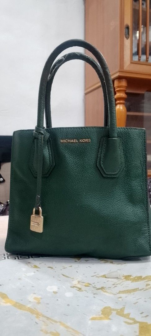 Michael Kors Green (Category: Luxury Bags & Wallets) located in Manila. Submitted by annemil_1984 (Listing ID 1461487442, Image 1). Description: mk 300 lv nano 350 lv 250 Burberry blue label 250.