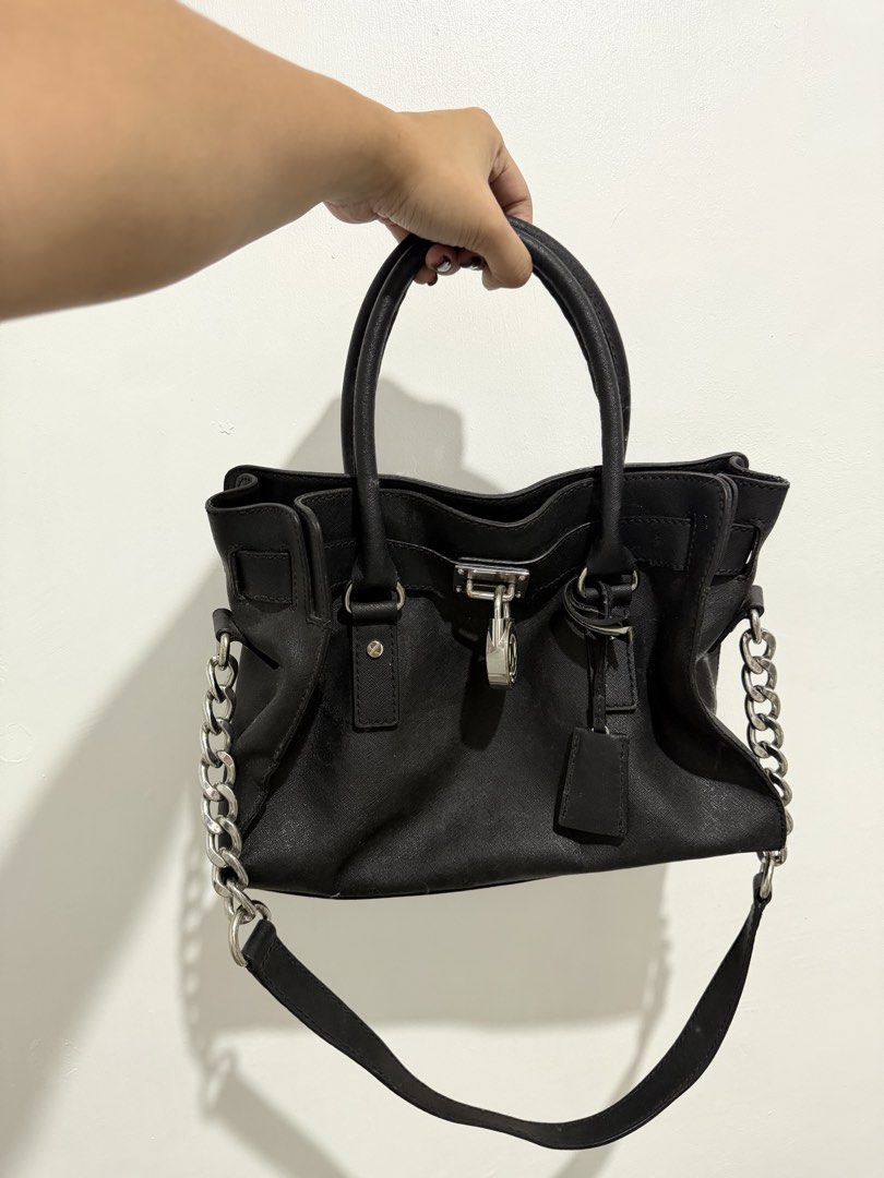 Michael Kors Hamilton Bag (Category: Luxury Bags & Wallets) located in Quezon City. Submitted by izaronario (Listing ID 1461514625, Image 1). Description: ✨ AUTHENTIC MICHAEL KORS HAMILTON SATCHEL ✨ A timeless Michael Kors classic with an effortlessly elegant silhouette — perfect for those who appreciate understated luxury and iconic design. 🤎 🇨🇦 Originally purchased in Canada Details: • Original Michael Kors Hamilton Satchel • Clean interior 