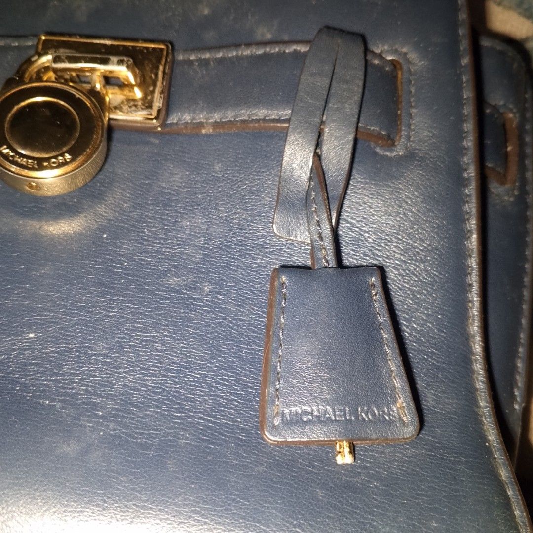 Michael Kors Navy Blue Leather Shoulder Bag (Category: Luxury Bags & Wallets) located in Antipolo. Submitted by jomavi20 (Listing ID 1461558396, Image 3). Description: - Authentic Michael Kors navy blue leather shoulder bag - Elegant gold hardware details - Secure turn-lock closure - Cute hanging brand charm - Adjustable shoulder strap for comfort - Ideal for everyday style and practicality.