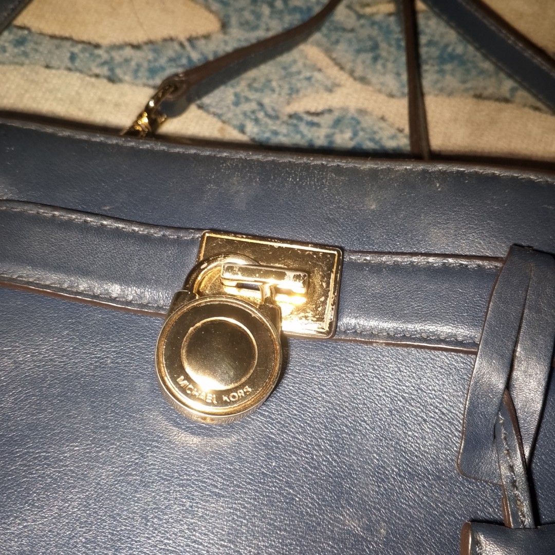 Michael Kors Navy Blue Leather Shoulder Bag (Category: Luxury Bags & Wallets) located in Antipolo. Submitted by jomavi20 (Listing ID 1461558396, Image 2). Description: - Authentic Michael Kors navy blue leather shoulder bag - Elegant gold hardware details - Secure turn-lock closure - Cute hanging brand charm - Adjustable shoulder strap for comfort - Ideal for everyday style and practicality.