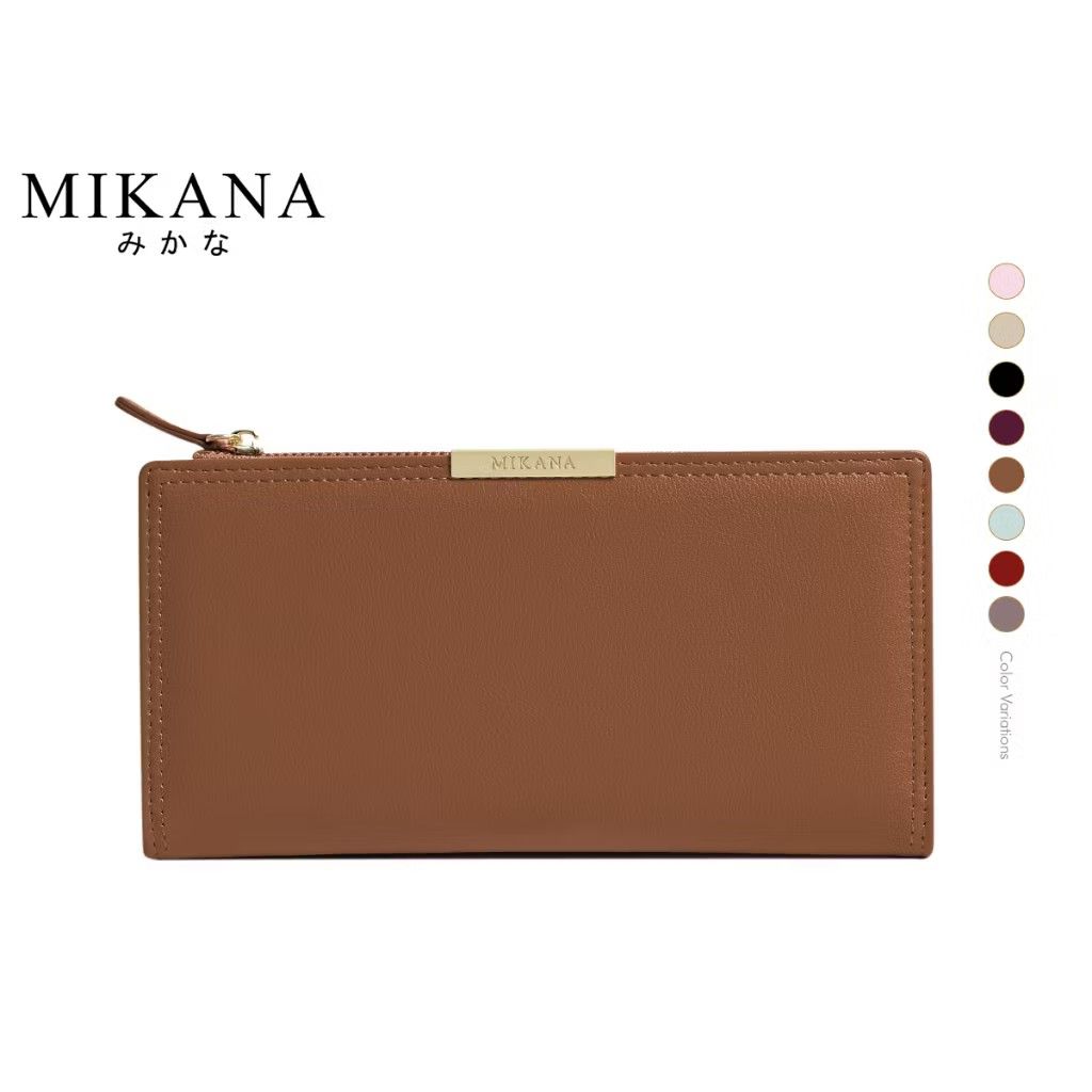 Mikana brown long wallet (Category: Wallets & Card holders) located in Antipolo. Submitted by ms.marieyahs (Listing ID 1461423361, Image 1). Description: Used once and na stock na sa drawer, may dents as you can see sa photos dahil sa kakatago.. but overall goods pa sya.. - can send more photos if needed. - lalamove shouldered by buyer.. - you may check my profile just in case may iba pang magustuhan. tnx!.